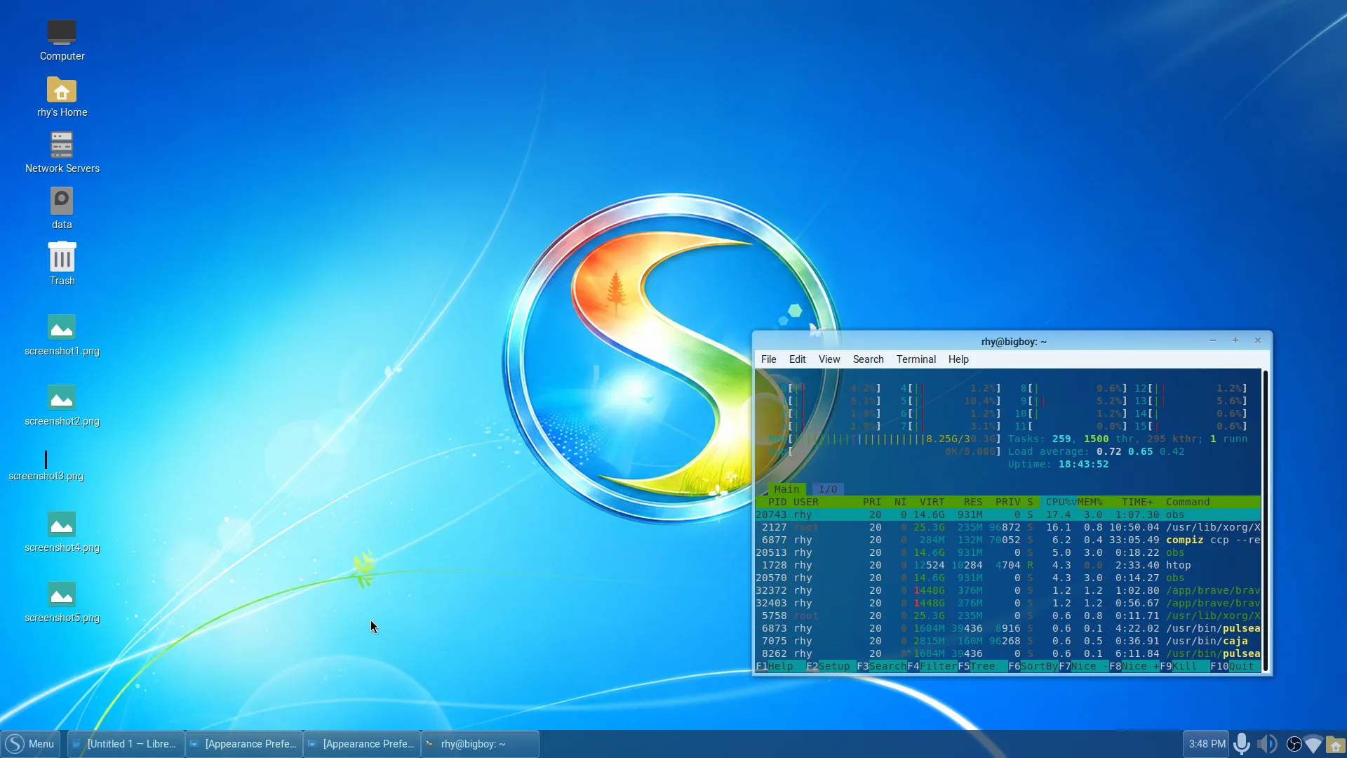 Spaced Linux Windows 7 light theme showing its desktop, panel, and coordinated window styling